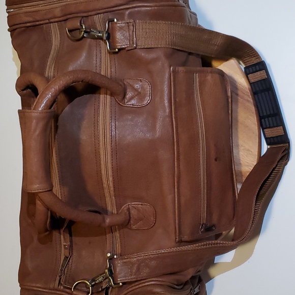 Disney Handbags - Vintage Disney Studios leather duffle bag.